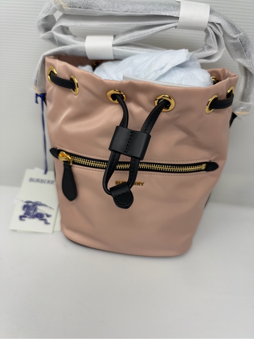 Burberry Blush Pink Drawstring Crossbody Bucket Bag with Black Trim
